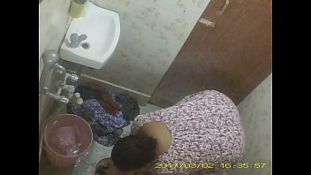 Mature Bengali Milf captured hidden cam washing
